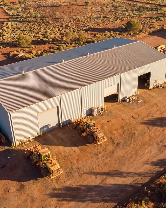 Aerial view of a site workshop and container laydown